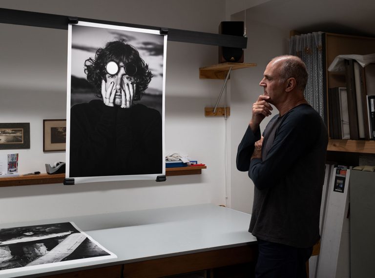 Ian Hill inspecting image 'Jack' by Simon Dow.